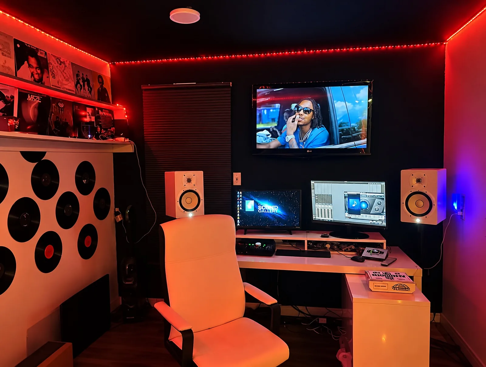 Houston recording studio with red lighting and white chair
